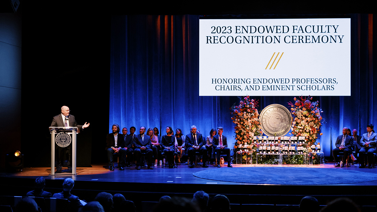 President Roberts speaking on stage