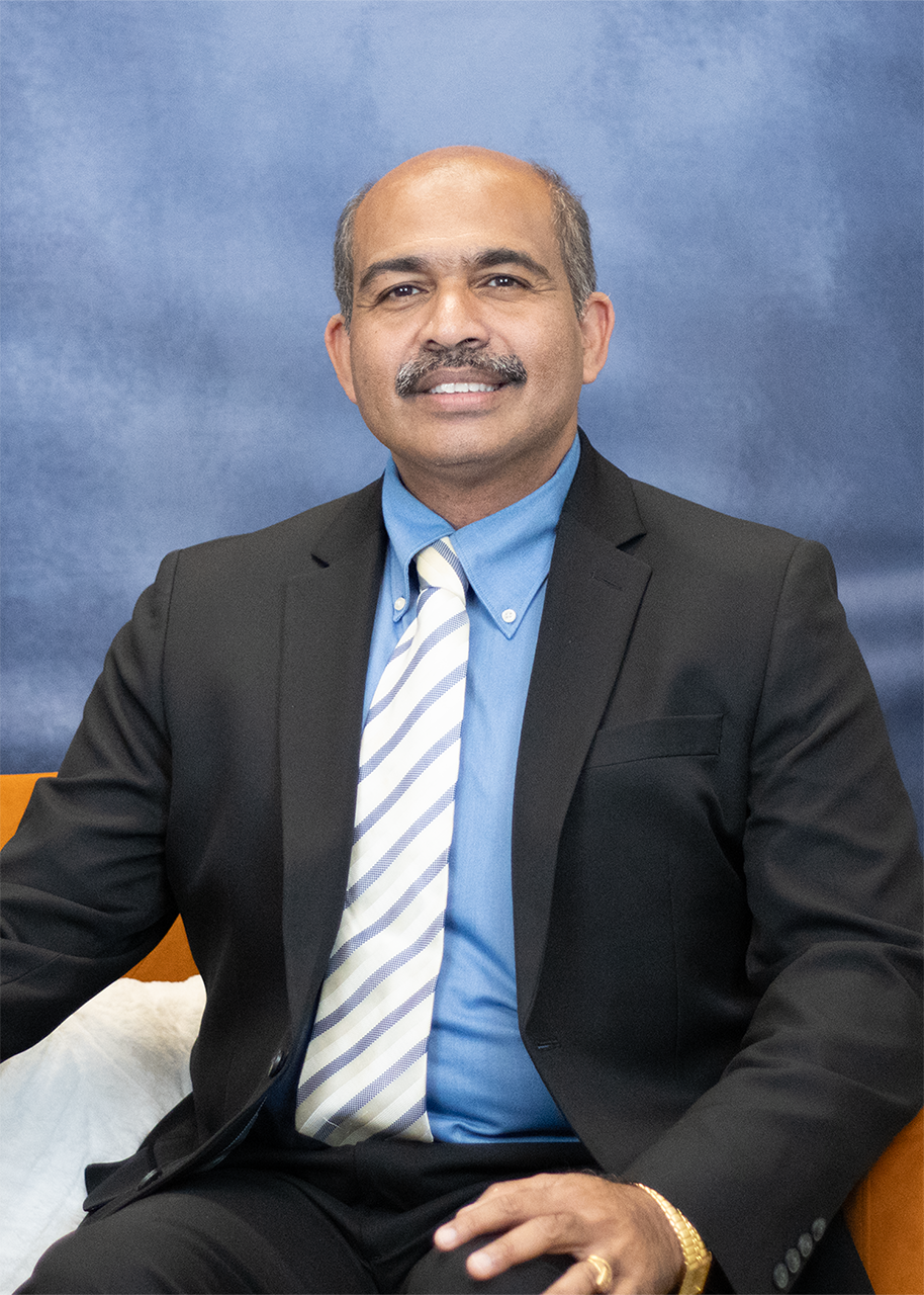 Murali Dhanasekaran seated