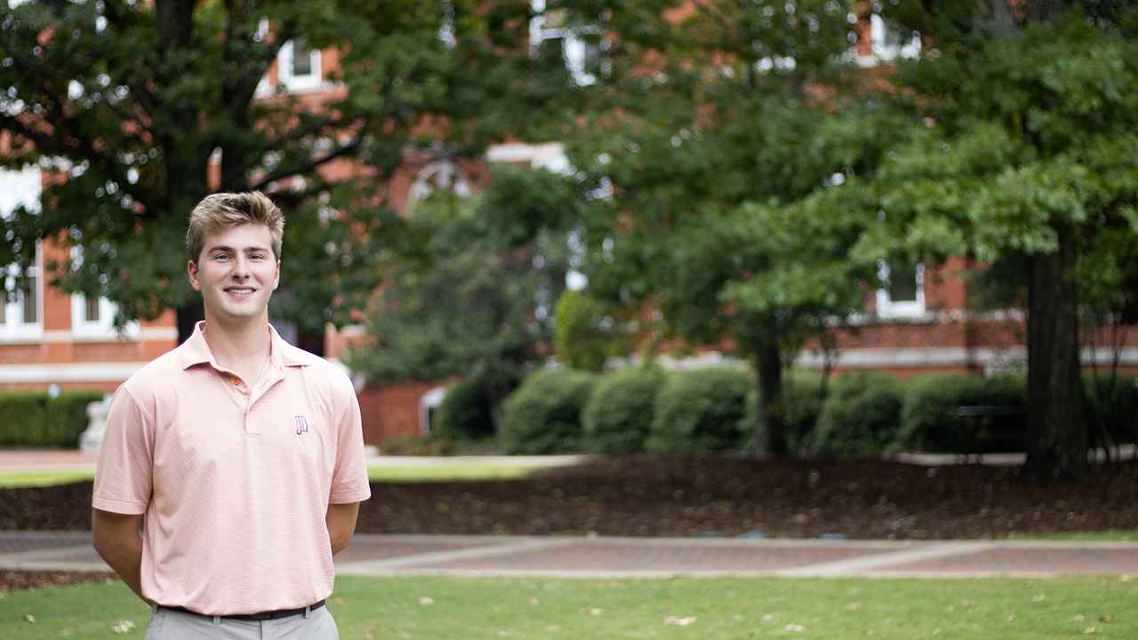 Andrew Wallis outside of Samford Hall