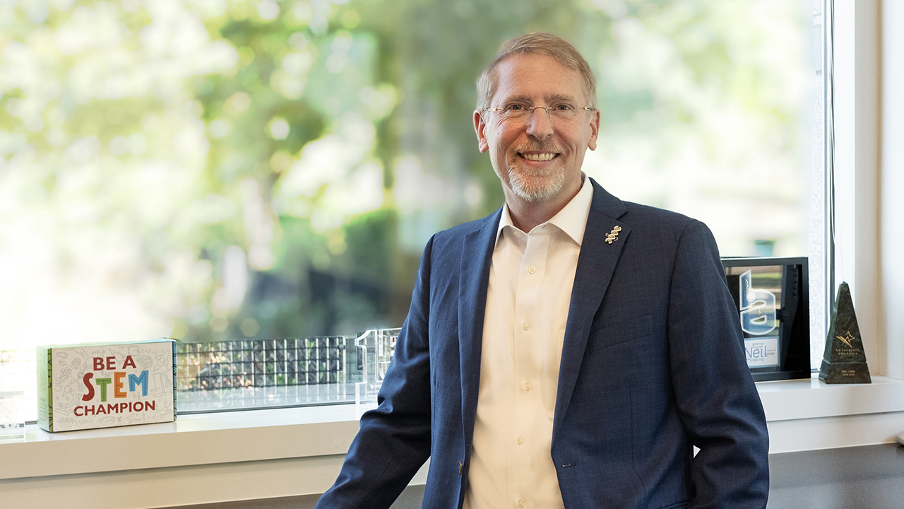 Dr. Neil Lamb standing